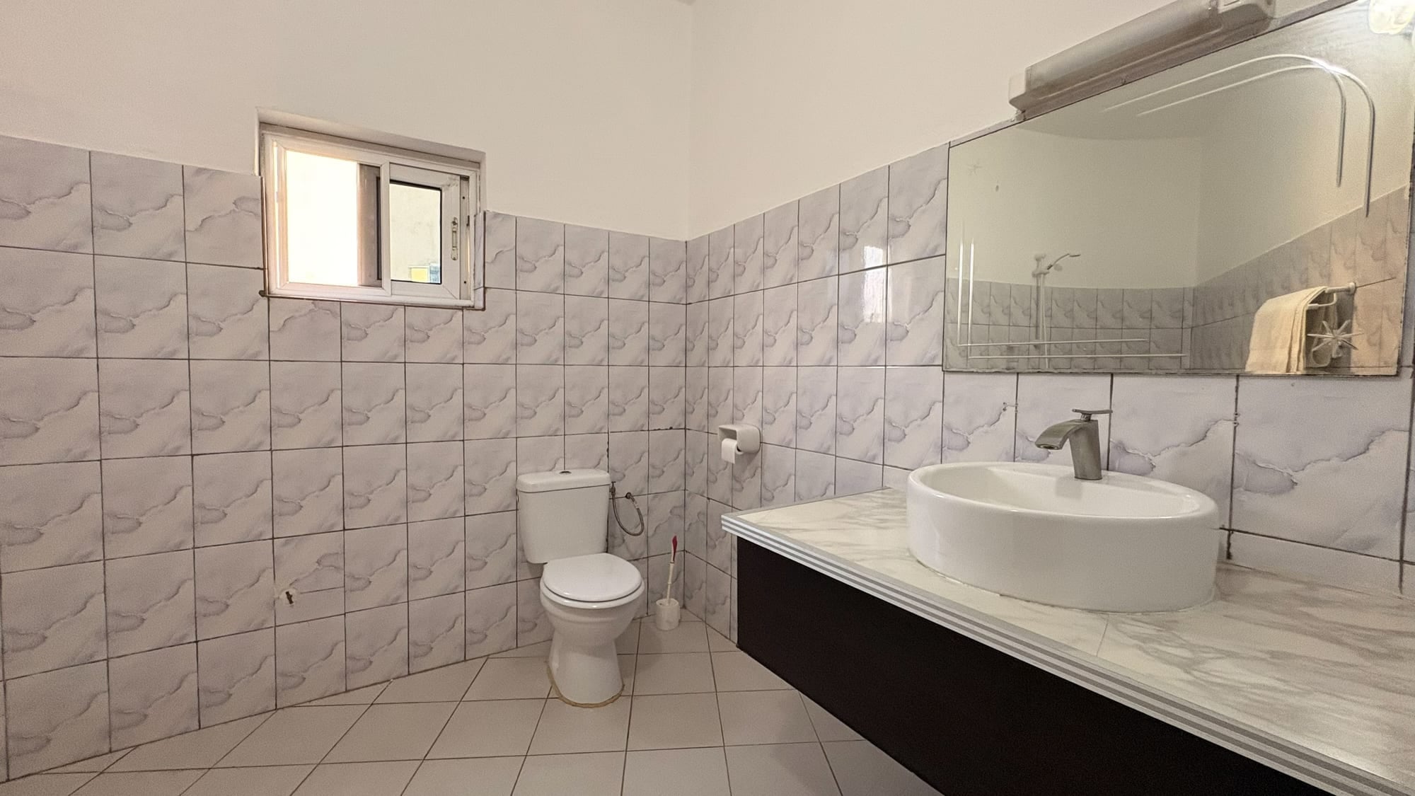 Salle de bain privative de Maison Stella, Avepozo, Lomé